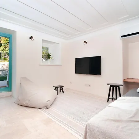 Holiday home Miniq Homes 102 - Historical Stone House With Garden Cinema